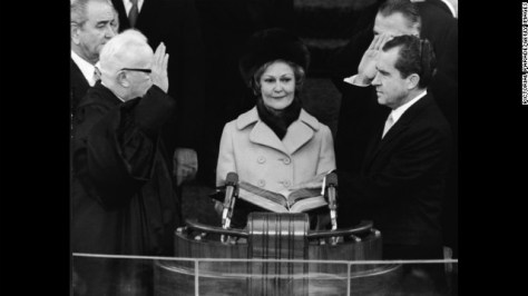 Richard Nixon takes the oath of office as he is sworn in as the 37th president of the United States on January 20, 1969