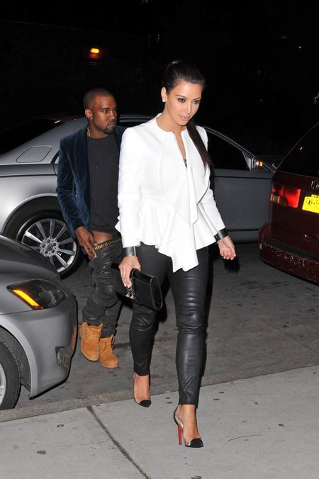 Hmmm, why Kanye West's pants go dey come down while getting out of a car with Kim Kardashian?