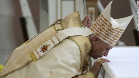 Benedict kisses the altar before addressing the crowds at Jasna Gora Monastery in Czestochowa, Poland, in May 2006.